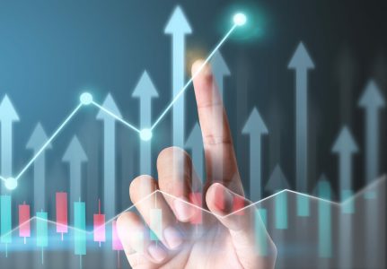 Businessman plan graph growth and increase of chart positive indicators in his business
